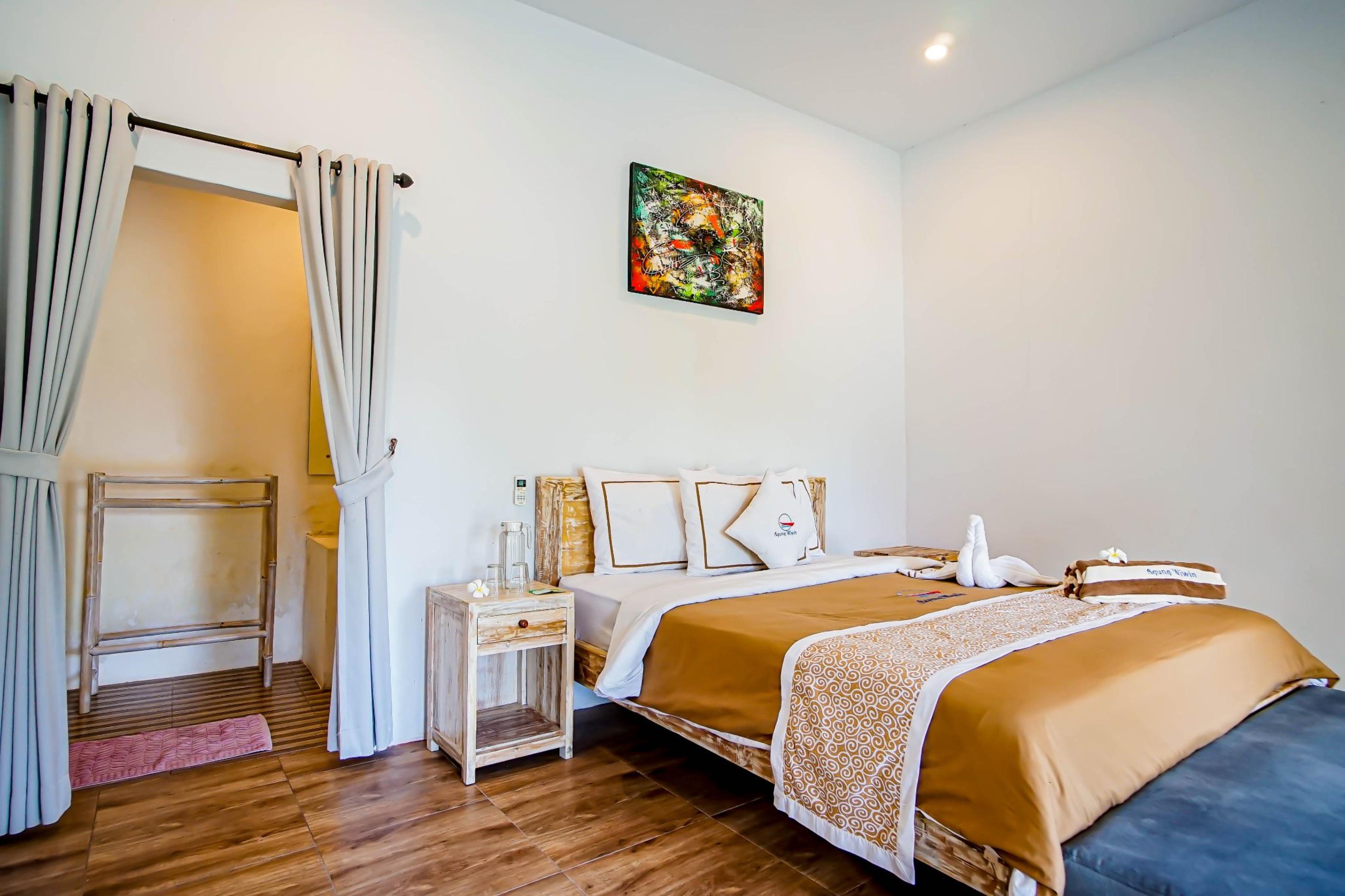 Agung Wiwin Homestay & Restaurant Mengwi Buitenkant foto