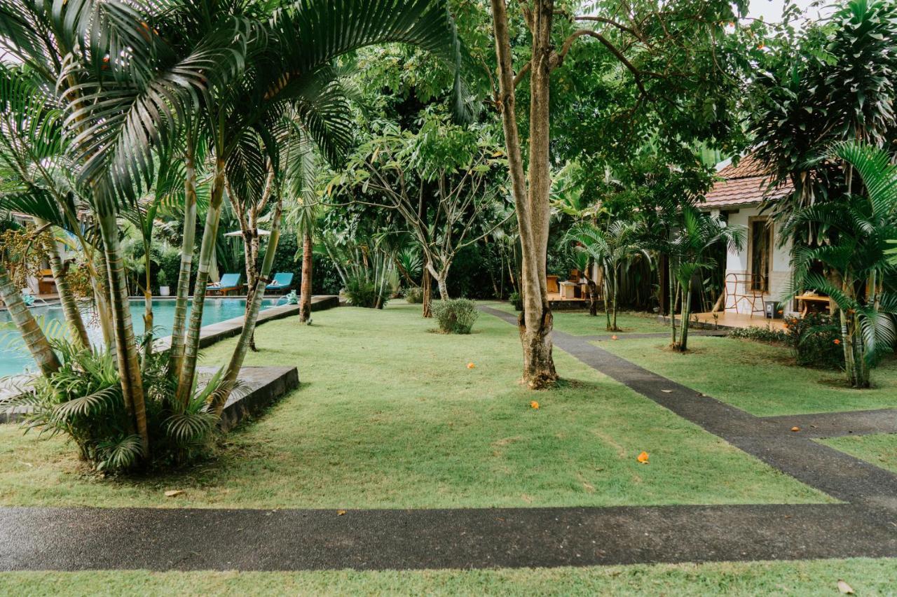 Agung Wiwin Homestay & Restaurant Mengwi Buitenkant foto
