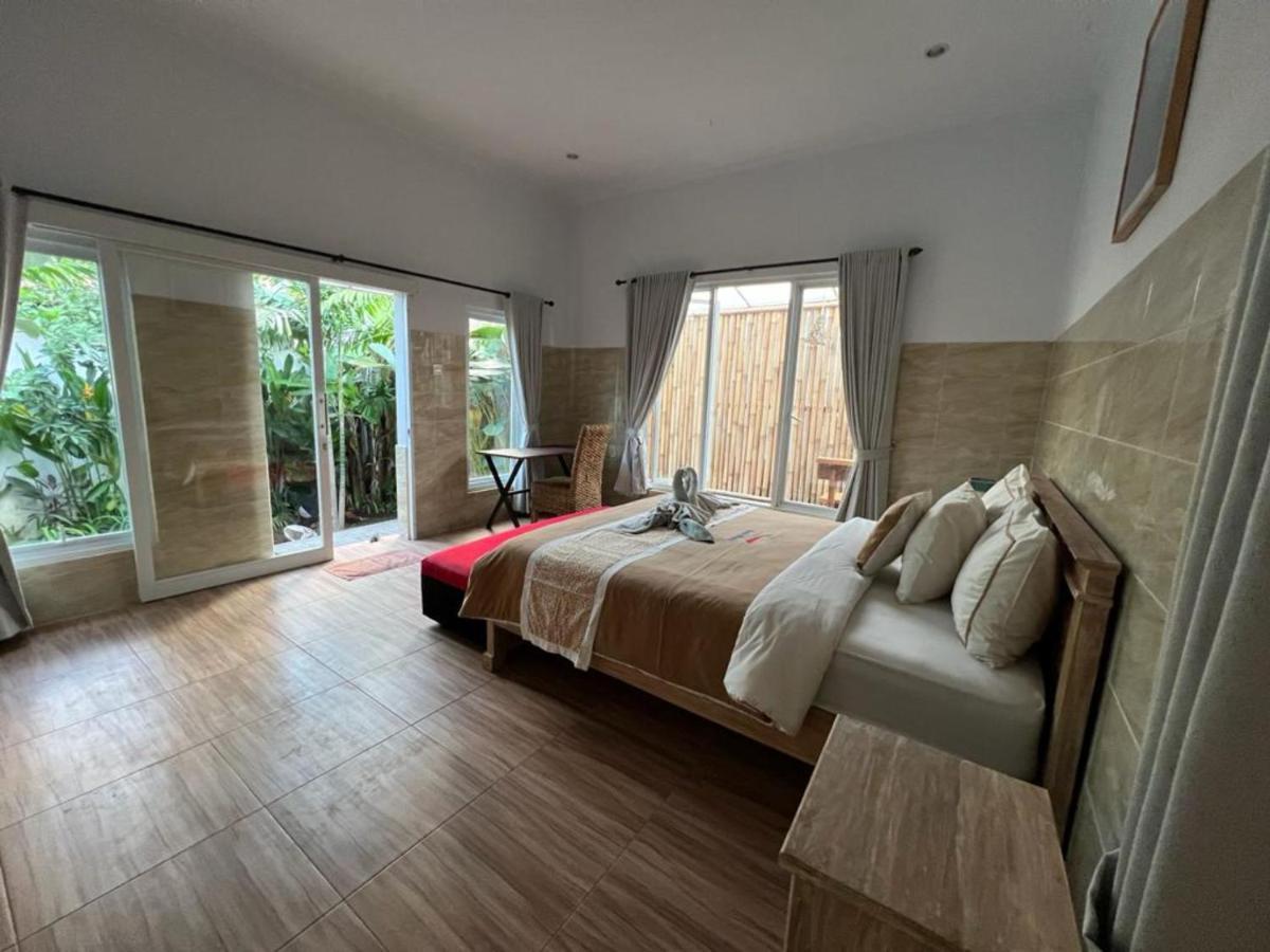 Agung Wiwin Homestay & Restaurant Mengwi Buitenkant foto