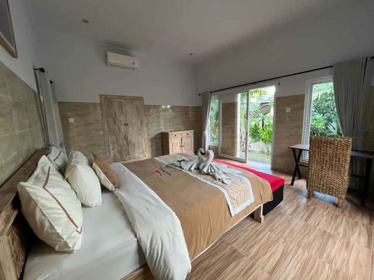 Agung Wiwin Homestay & Restaurant Mengwi Buitenkant foto