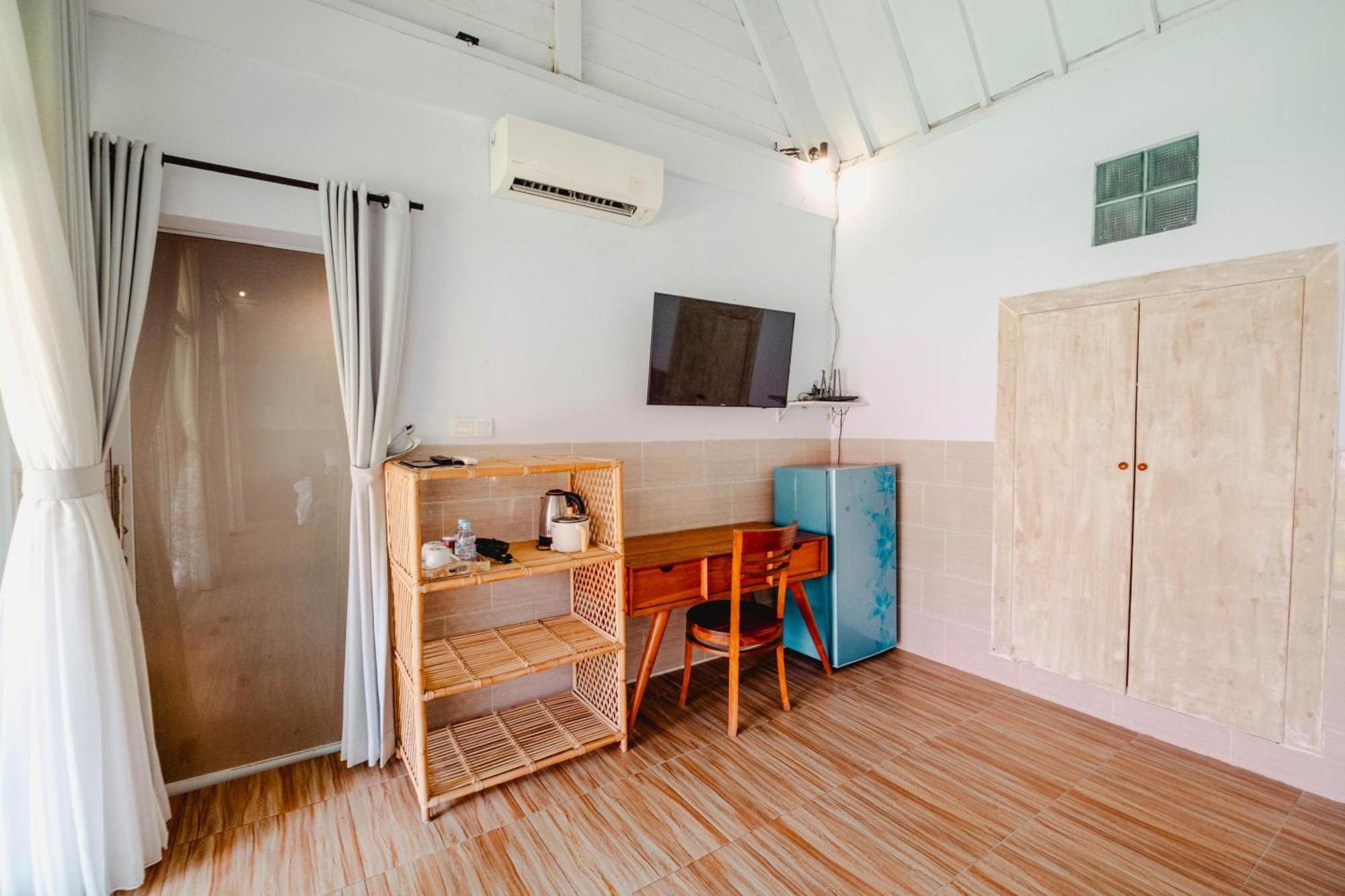 Agung Wiwin Homestay & Restaurant Mengwi Buitenkant foto