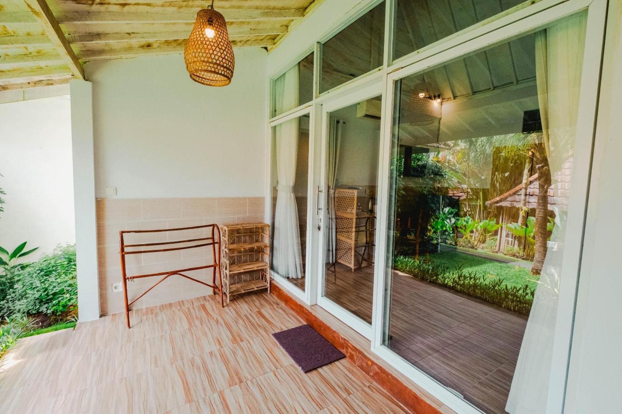 Agung Wiwin Homestay & Restaurant Mengwi Buitenkant foto