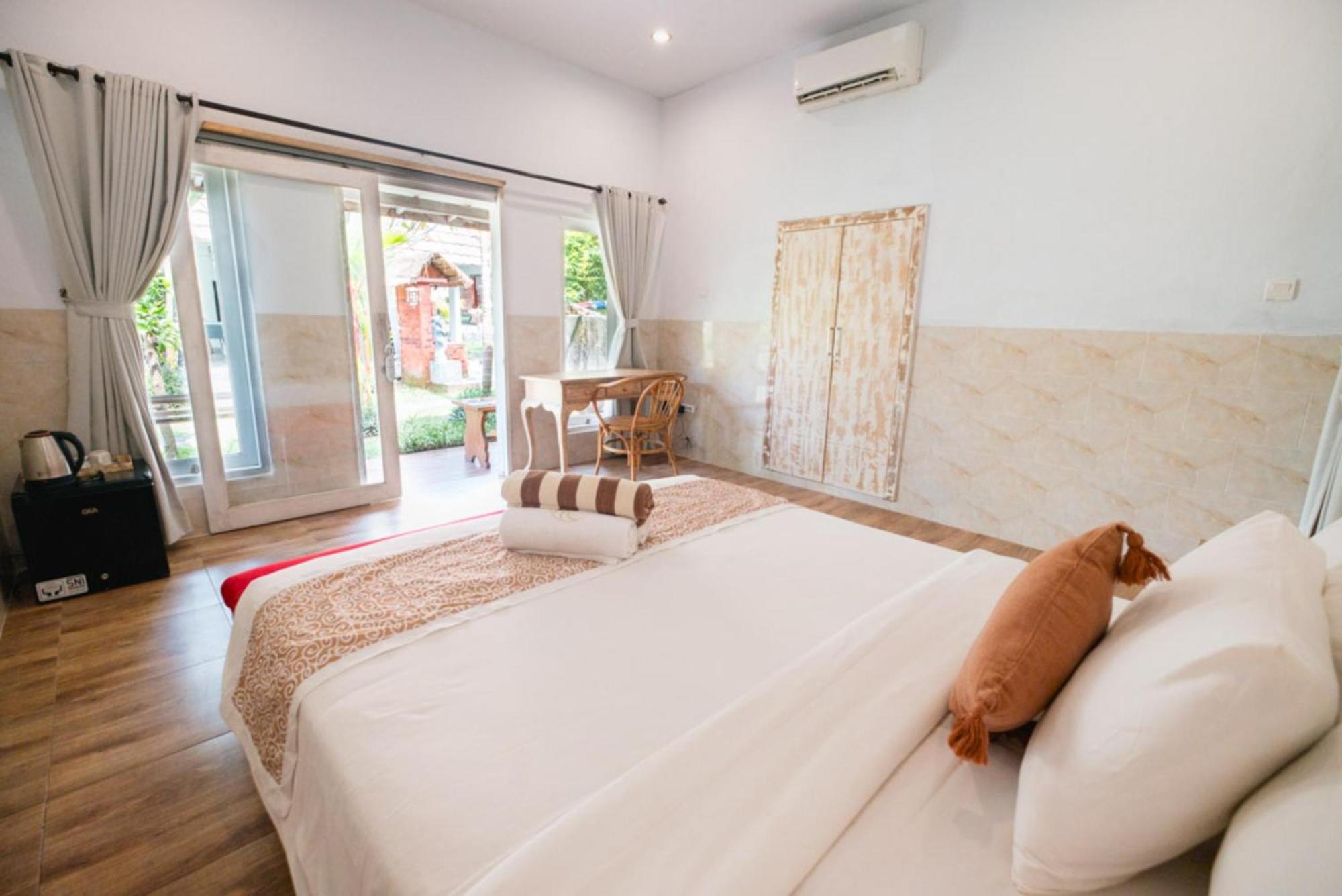 Agung Wiwin Homestay & Restaurant Mengwi Buitenkant foto