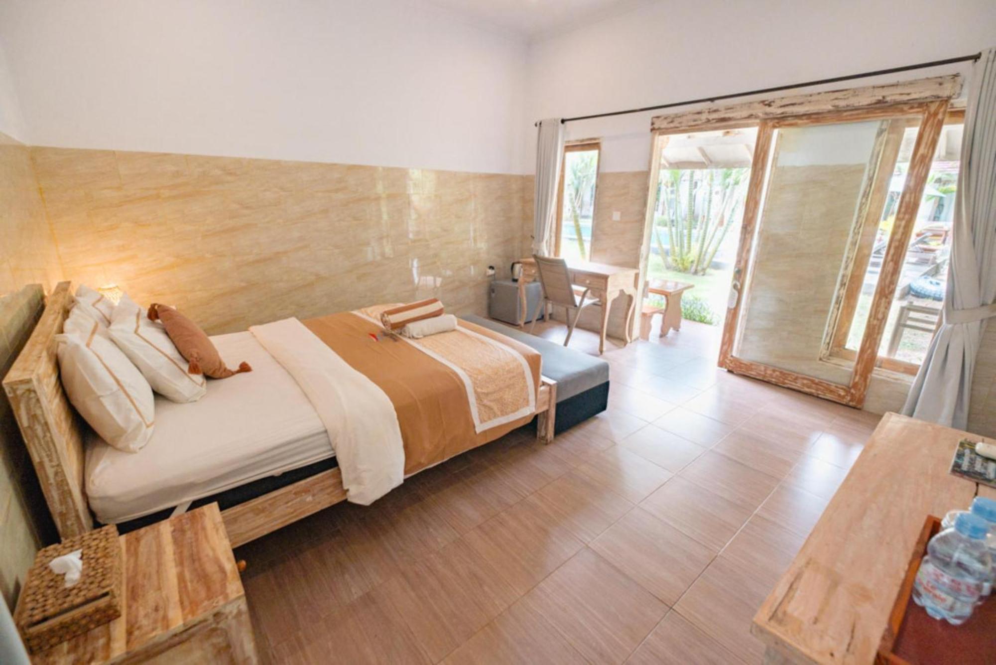 Agung Wiwin Homestay & Restaurant Mengwi Buitenkant foto